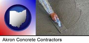 smoothing a concrete surface with a trowel in Akron, OH