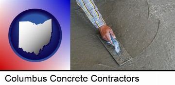 smoothing a concrete surface with a trowel in Columbus, OH