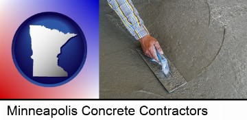 smoothing a concrete surface with a trowel in Minneapolis, MN