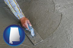 alabama map icon and smoothing a concrete surface with a trowel