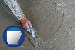 arkansas map icon and smoothing a concrete surface with a trowel
