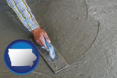 iowa map icon and smoothing a concrete surface with a trowel
