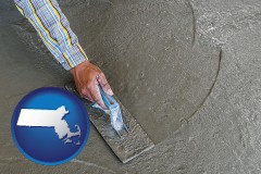 massachusetts map icon and smoothing a concrete surface with a trowel