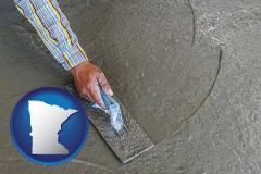minnesota map icon and smoothing a concrete surface with a trowel