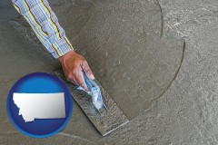 montana map icon and smoothing a concrete surface with a trowel