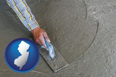 new-jersey map icon and smoothing a concrete surface with a trowel