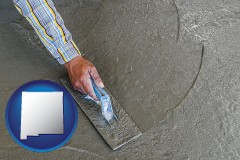 new-mexico map icon and smoothing a concrete surface with a trowel