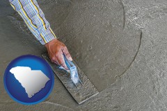 south-carolina map icon and smoothing a concrete surface with a trowel