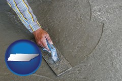 tennessee map icon and smoothing a concrete surface with a trowel