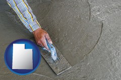 utah map icon and smoothing a concrete surface with a trowel