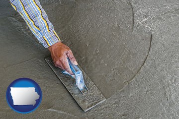 smoothing a concrete surface with a trowel - with Iowa icon