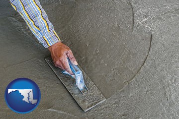 smoothing a concrete surface with a trowel - with Maryland icon