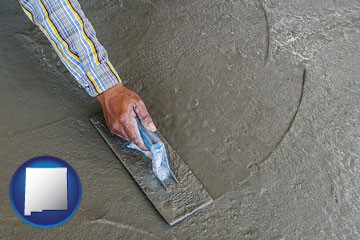smoothing a concrete surface with a trowel - with New Mexico icon