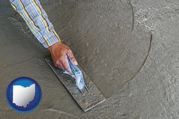 smoothing a concrete surface with a trowel - with Ohio icon