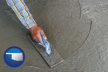 smoothing a concrete surface with a trowel - with Oklahoma icon