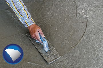 smoothing a concrete surface with a trowel - with South Carolina icon