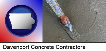 smoothing a concrete surface with a trowel in Davenport, IA