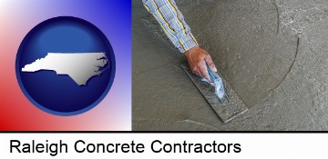 smoothing a concrete surface with a trowel in Raleigh, NC
